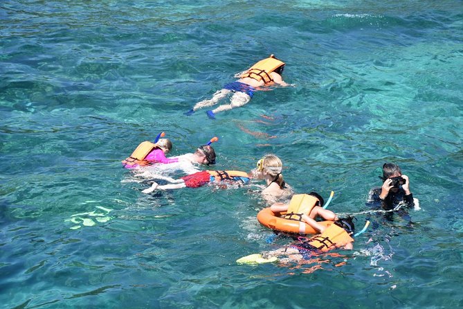 4 Island Snorkel Tour to Emerald Cave by Speed Boat from Koh Lanta - Small karst islets and fish-feeding stops