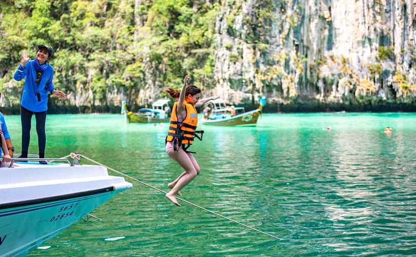 From Phi Phi: Sunset & Plankton Swim Tour By Speedboat - A six-hour route through Phi Phi’s greatest hits