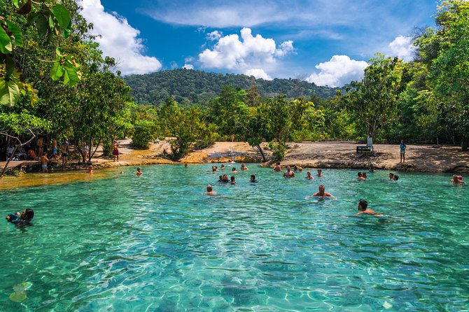 Full-Day Tour to Emerald Pool, Hot Springs & Tiger Cave Temple from Krabi - Walking through the rainforest to Emerald Pool