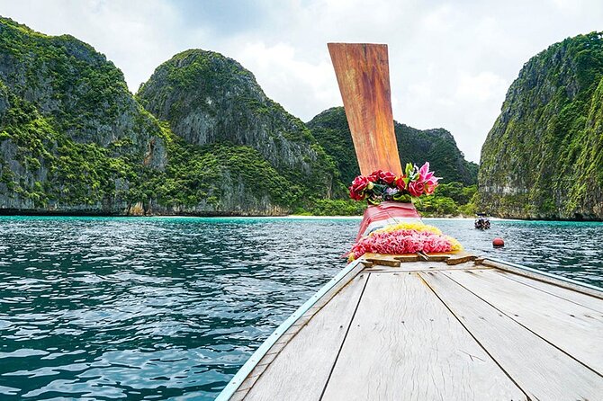 Half Day Tour Around Phi Phi Islands By Private Longtail Boat From Phi Phi - Maya Bay and the reality behind the movie