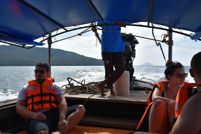 Hong Island Sunset Tour with Buffet Dinner & Night Snorkeling - Hong Island by traditional longtail boat