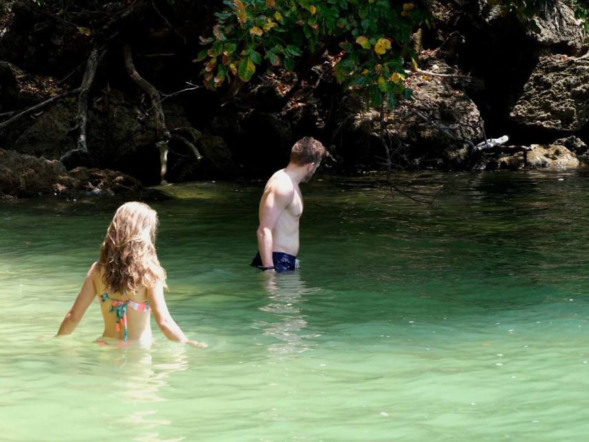 Ko Lanta: Full-Day Love Kayak Caves & Beaches Kayak Tour - Ko Aung and the open-water boat ride