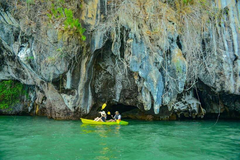 Ko Lanta: Full-Day Mangrove and Sea Cave Kayaking Experience - Koh Talabeng, cliffs and old pirate caves