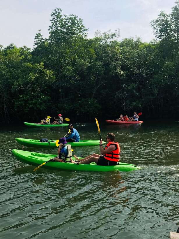 Ko Lanta: Half-Day Mangrove Kayaking Tour with Lunch - The village, fish farm, and lunch stop