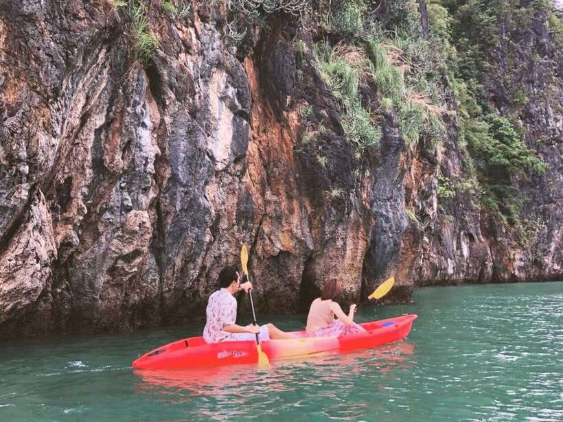 Koh Lanta: Sea Cave Kayaking and Talabeng Island Tour - Taking the longtail boat toward Ung Island