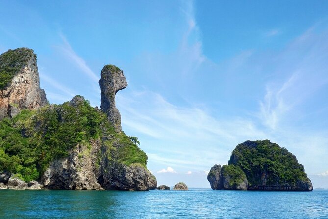 Krabi 4 Islands Speedboat Tour Snorkeling and Beach Lunch - Phra Nang Cave adds a local spiritual detail