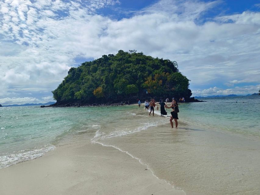 Krabi: 7 Island Sunset With BBQ & Plankton Speed Boat Tour - Thale Waek: walking the sandbar between three islands