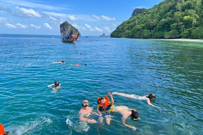 Krabi 7 Islands Snorkeling, Sunset Dinner & Plankton Night - Poda Island, sunset, and the beach barbecue