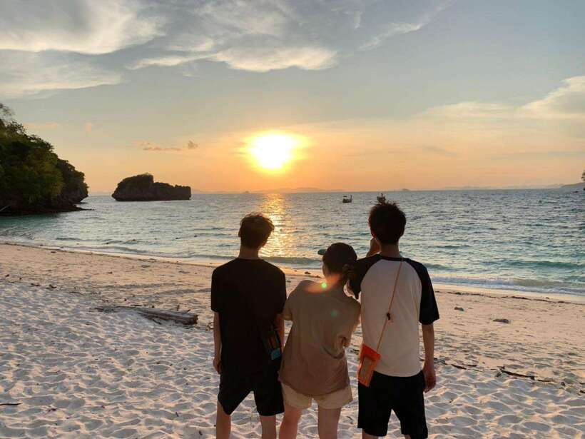 Krabi: 7 Islands Sunset & Plankton Swim with BBQ Dinner - Snorkeling in clear water, with a jellyfish warning