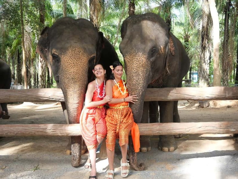 Krabi: Elephant Feeding Program with Traditional Thai Dress - Key points at a glance