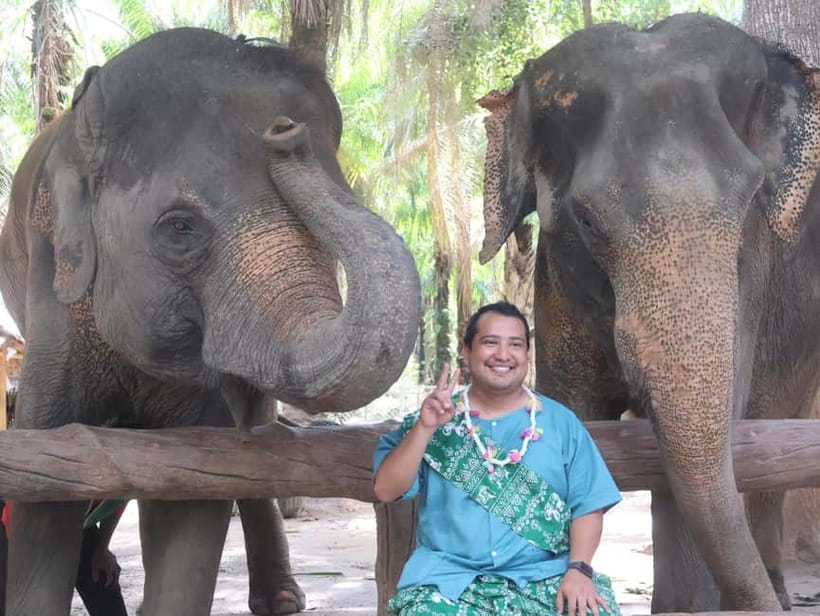 Krabi: Elephant Feeding Program with Traditional Thai Dress - Photo help without a professional photographer