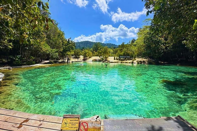 Krabi: Emerald Pool, Hot Springs, and Kayaking Tour - Walking the wooden path to Emerald Pool