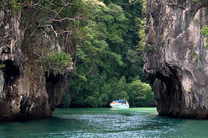 Krabi Hong Island Tour: Charter Private Long-tail Boat - Hong Lagoon, limestone walls, and boat traffic