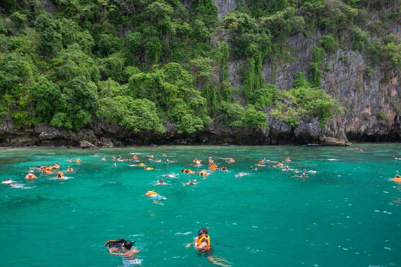 Phi Phi: 7 Islands longtail boat with Sunset and Plankton - Loh Samah Bay leads to Maya Bay on foot