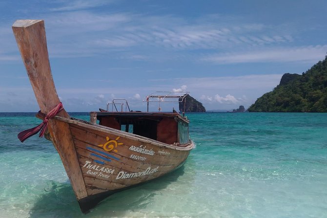 Railay and 4-Island Sunset Speedboat Cruise with Night Snorkel - Daytime snorkeling and the limits of nature